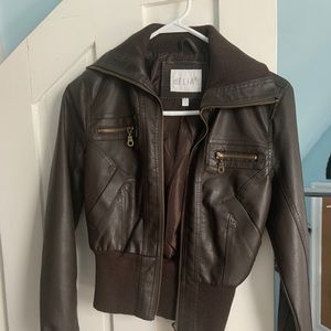 Delia’s brown leather jacket